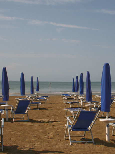 Beach umbrellas at bibione photo